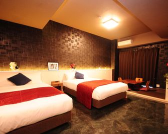 Hotel Japanesque Fukuoka - Fukuoka - Yatak Odası