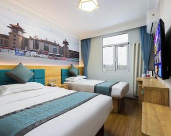 Zhong An Hotel Beijing Former Residence of Journalist Edgar Snow -Free laundry service,Free freshly ground coffee,Provide tourism and ticketing service ,English service ,Near Tian'AnMen Forbidden City,Wangfujing walking street - Beijing - Bedroom