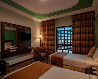 Taiba Suites Madinah - Medina - Bedroom