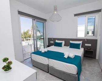 拉提亞納花園飯店 - 帕拉利米尼 - 臥室