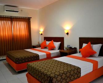 Helios Hotel Malang - Malang - Bedroom