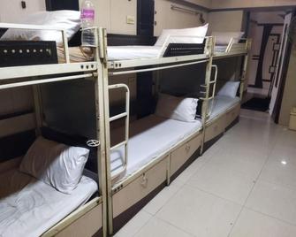 Apollo Guest House - נבי מומבאי - חדר שינה