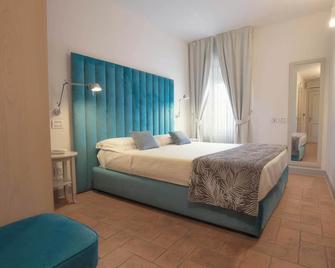 Hotel Sorella Luna - אסיסי - חדר שינה