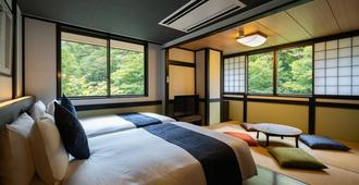 Onsen Guesthouse Tsutaya - Hostel - Hakone - Habitación