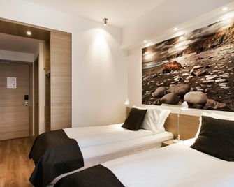 فندق ستورم باي كياهوتيلز - ريكيافيك - غرفة نوم