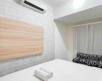 Comfort And Minimalist 1Br Apartment Vida View Makassar - Makassar - Bedroom