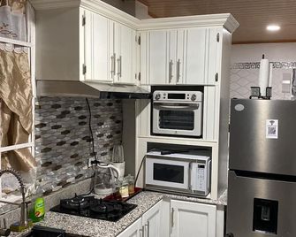 Odyssey Suites - Georgetown - Kitchen