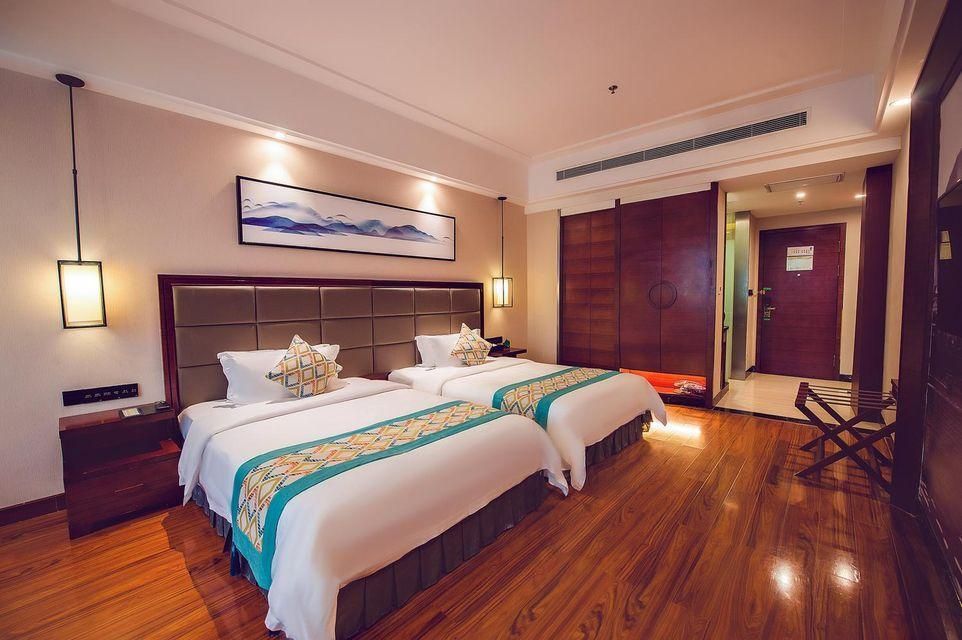 Biancheng Internationl Hotel - Xiangxi - Bedroom