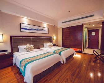 Biancheng Internationl Hotel - Xiangxi - Bedroom