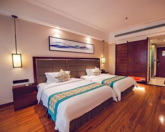 Biancheng Internationl Hotel - Xiangxi - Bedroom