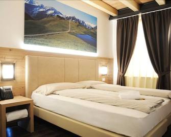 Touring Hotel & Spa - 에돌로 - 침실