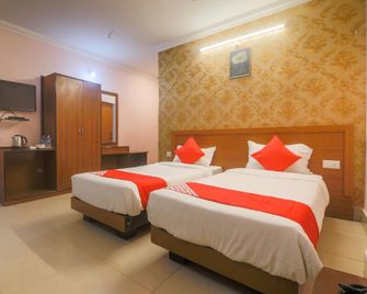 OYO 29968 D'courtyard Resort - Kaziranga - Bedroom