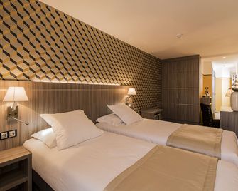 Unique Hôtel Résidence & Spa - סן-רפאל - חדר שינה