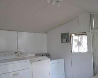 Automated RV Space check in at Alexsandrarvpark.com - Full Hook Up Spaces Only - Brazoria - Laundry facility