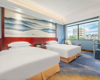 Weiselect Mengzi Tian Yuan Hotel - Honghe - Habitación