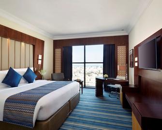 رويال تيوليب مسقط - مسقط - غرفة نوم