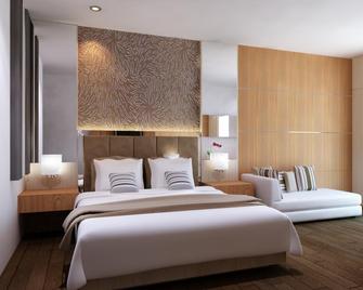 Neotel Hotel City Centre - Tanjung Redeb - Bedroom