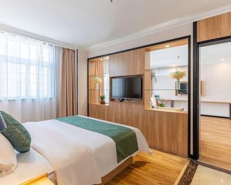 Greentree Inn Anhui Province Anqing Guangcai Big Market Bus Terminal Business Hotel - Anqing - Chambre