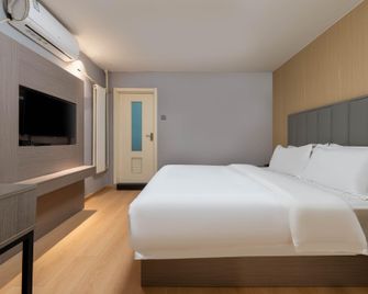 7 Days Inn Beijing West Railway Station Maliandao Wanzi Metro Branch - Pekín - Habitación
