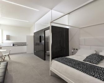 Nostos rooms & Apartments - Siracusa - Bedroom