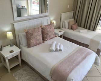 La Mer Guesthouse - Puerto Elizabeth - Habitación