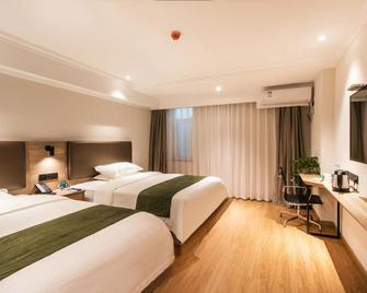 GreenTree Inn Suzhou Humble Administrator's Garden Railway Station South Square - Suzhou - Bedroom