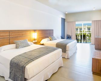 Hotel Riu Emerald Bay - מזטלאן - חדר שינה