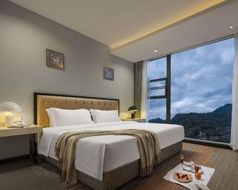Zhizun Yihao Hotel - Tongren - Habitación