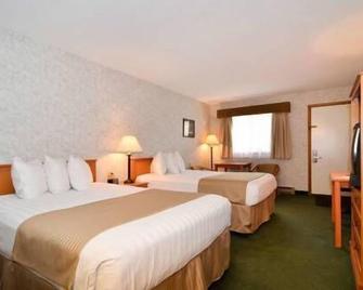Ubar Inn & Suites - Canistota - Bedroom