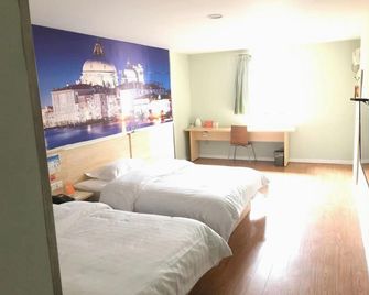 7Days Inn Suining Kaixuanxia Road - Suining - Slaapkamer
