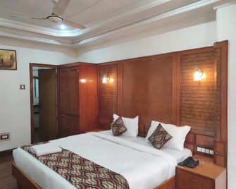 Hotel Ambarish Grand Residency - Guwahati - Bedroom