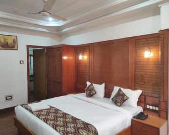 Hotel Ambarish Grand Residency - Guwahati - Bedroom