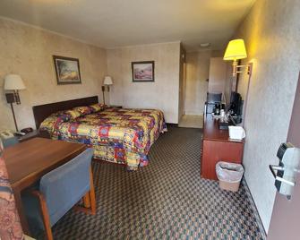 Richmond Inn and Suites - Richmond - Schlafzimmer