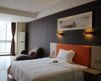 7 Days Premium Jingjiang Fuhai New World Automobile Terminal Branch - Tchaj-čou - Ložnice