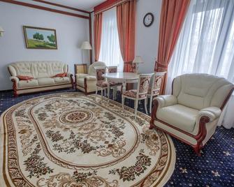 Tygyn Darkhan Hotel - Yakutsk - Living room
