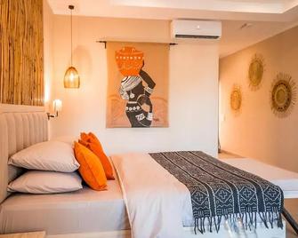 Bakadaji Hotel - Serrekunda - Schlafzimmer