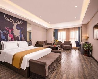 Dingmei Light Luxury Hotel (Dezhou Wanda Plaza) - Dezhou - Slaapkamer