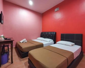 Spot On 89865 Hotel Titiwangsa Gm - Gua Musang - Bedroom
