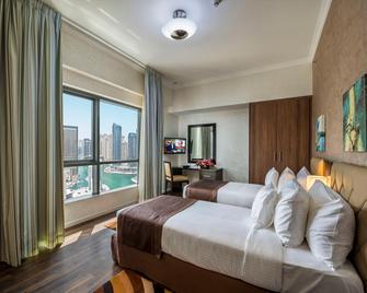 City Premiere Marina Hotel Apartments - Дубай - Спальня