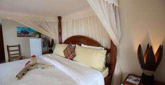 Beach Front Apartment- Complimentary Breakfast - Soufrière - Bedroom