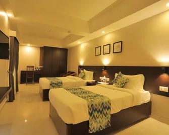 D Fort Hotel Kollam - Kollam - Camera da letto