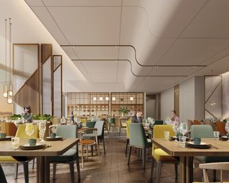 إيفين شينجداو لاوشان باي آيتش جي - تشينغداو - مطعم