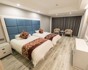 Jinou Hotel - Wenzhou - Habitación