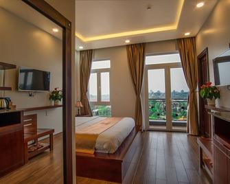 Spring Garden Hotel - Long Khanh - Camera da letto