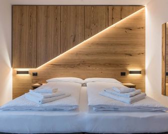 Appartamento Campanile Basso - San Lorenzo in Banale - Chambre