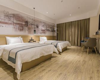 City Comfort Inn Foshan Shishan Square - Foshan - Bedroom