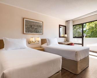 Days Inn Montevideo - Montevideo - Phòng ngủ