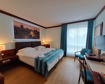 Leine Hotel - Pattensen - Slaapkamer