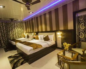 Hotel Kings Regency - Dhaliara - Bedroom