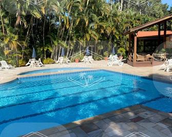 Flat Perfeito Flat Amarilis em Riviera São Lourenço com café da manhã e enxoval completo toalhas praia e piscina com trocas - Bertioga - Uima-allas
